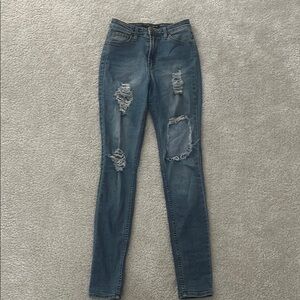 Women's Distressed Blue Jeans